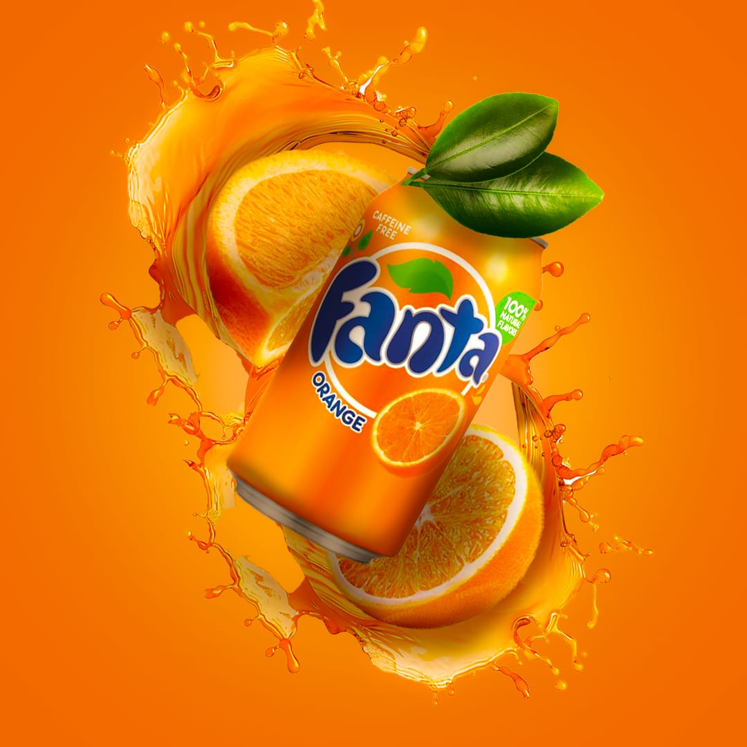 A can of orange soda splashing through orange slices