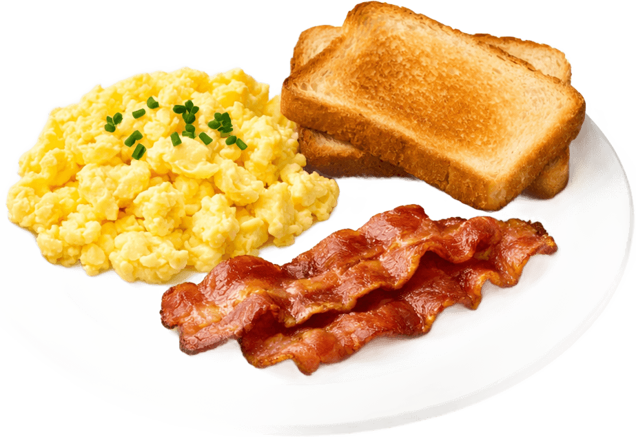 A breakfast platter with scrambled eggs, bacon and toast